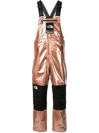 Supreme Tnf Metallic Bib Pant In Gold