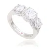 Suzy Levian Sterling Silver Cubic Zirconia White Three Stones Halo Engagement Ring In Metallic