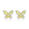 Suzy Levian Sterling Silver Gala White Cubic Zirconia Pave Butterfly Cluster Earrings In Yellow