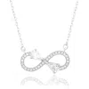 Suzy Levian Sterling Silver White Cubic Zirconia Infinity Multi-cut Necklace In Metallic
