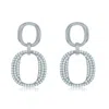 Suzy Levian Yellow Sterling Silver White Cubic Zirconia Oval Shape Drop Earrings In Metallic