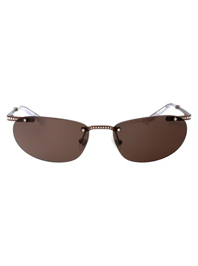 Swarovski 0sk7019 Sunglasses In Brown