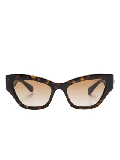 Swarovski Sonnenbrille Mit Cat-eye-gestell In Braun