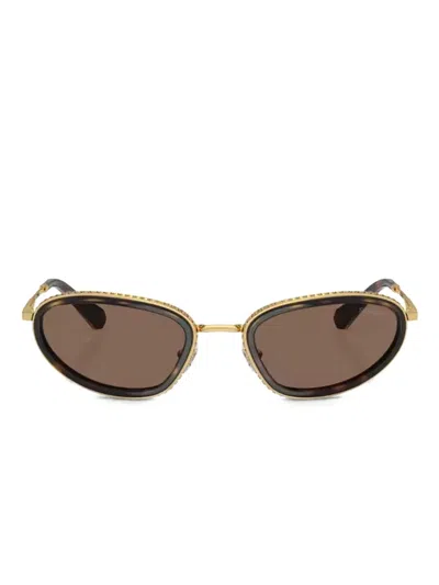 Swarovski Eyewear Embellished Oval-frame Sunglasses In Gold