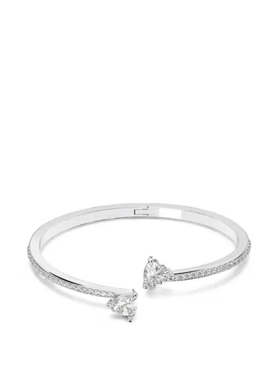 Swarovski Mesmera Heart-motif Crystal-embellished Bangle In Metallic