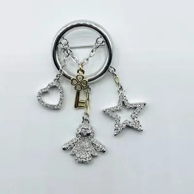 Swarovski Rhodium Key Heart Star And Doll Charms Circle Brooch In Silver