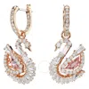 Swarovski Rose Gold-tone Plated Swan Drop Earrings In Pink