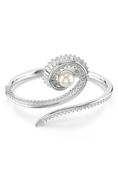SWAROVSKI SWAROVSKI X ARIANA GRANDE TREBLE CLEF CRYSTAL & FAUX PEARL BANGLE BRACELET
