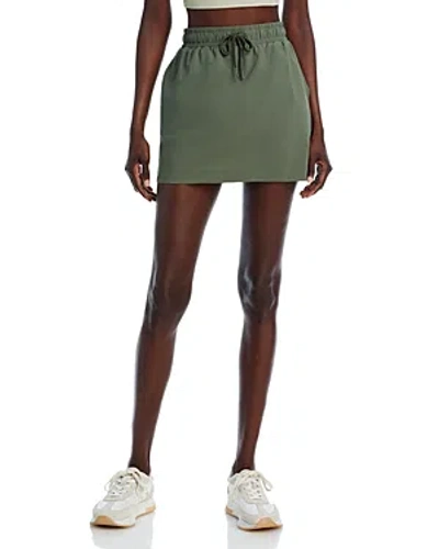 Sweaty Betty Explorer Mini Skirt In Ivy Green
