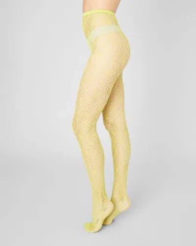 Swedish Stockings Lykke Net Tights In Yellow