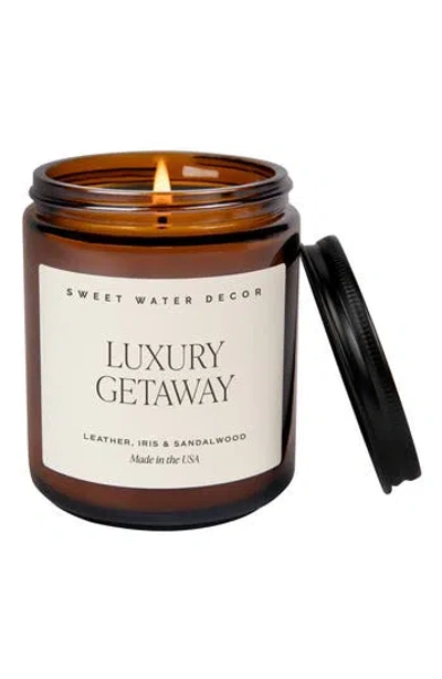 Sweet Water Decor Luxury Getaway Amber Jar Candle In Brown