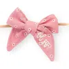 Sweet Wink Lil Sis Bow Baby Headband In Purple