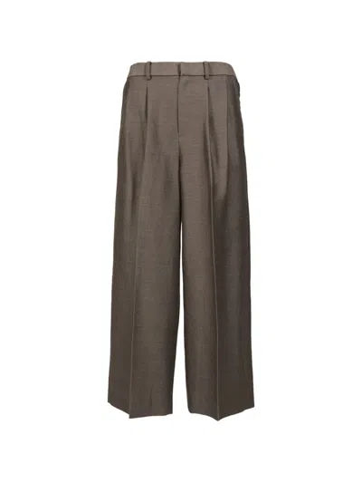 Taakk Pleated Wide-leg Trousers In Brown