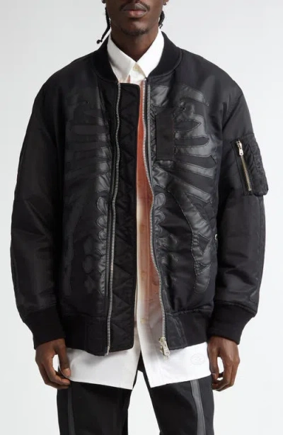 TAKAHIROMIYASHITA THE SOLOIST TAKAHIROMIYASHITA THESOLOIST. BONE APPLIQUÉ NYLON FLIGHT JACKET