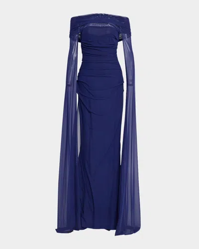 Talbot Runhof Off-the-shoulder Ruched Mesh Cape Gown In 427 Cobalt