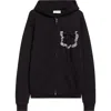 Tanner Fletcher Gender Inclusive Bennett Bow Pocket Cotton Zip-up Hoodie In Black