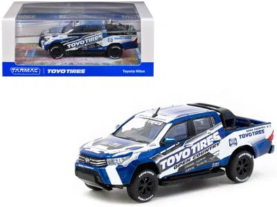 Tarmac Works Toyota Hilux Pickup Truck Rhd (right Hand Drive) "toyo Tires" White And Blue With Graphics "hobby64"