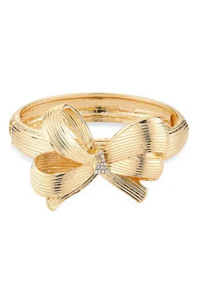 Tasha Bow Hinge Bracelet In Gold