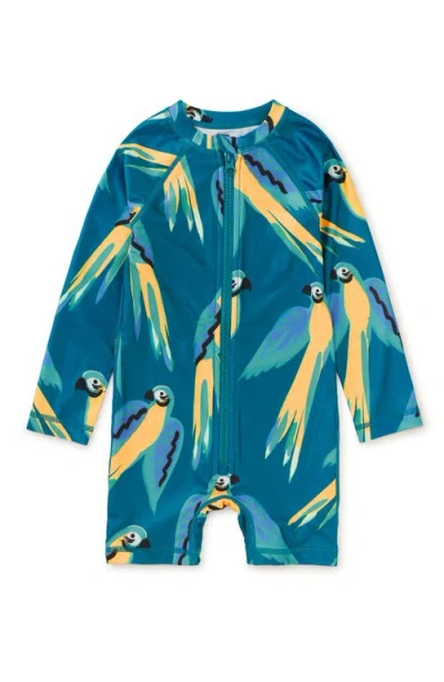 Tea Collection Rash Guard Baby Swimsuit In Blue & Yellow Macaws