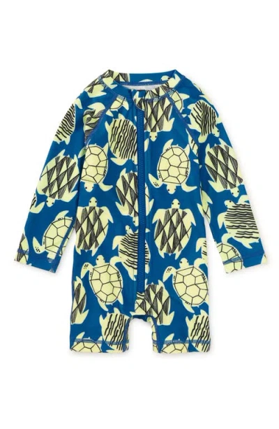 Tea Collection Rash Guard Baby Swimsuit In Tiled Turtles
