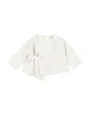 Teddy & Minou Overcoats In White