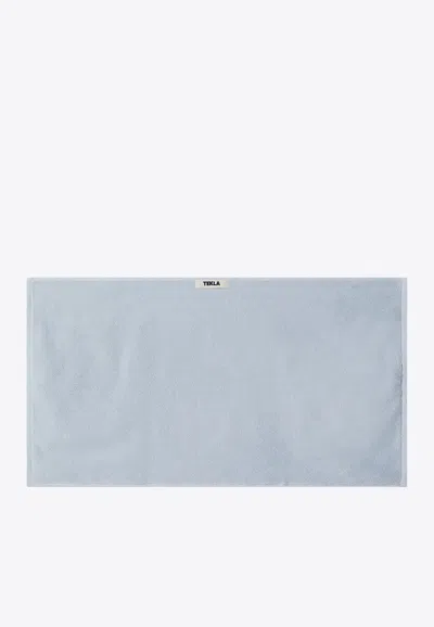 Tekla Logo-printed Bath Towel In Blue