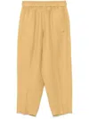 Tela Fluid Fabric Tapered Pants With Elasticized Waistband In Yellow
