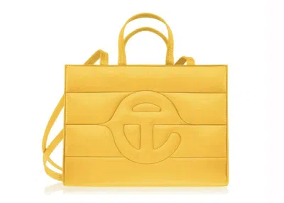 Pre-owned Telfar Medium Puff Shopping Bag In Yellow