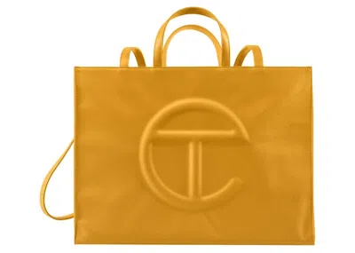 Pre-owned Telfar Shopping Bag Large In Mustard In Yellow