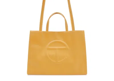 Pre-owned Telfar Shopping Bag Medium In Yellow