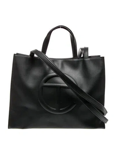 Pre-owned Telfar Vegan Leather Bucket Bag In Black