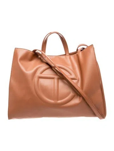 Pre-owned Telfar Vegan Leather Bucket Bag In Brown
