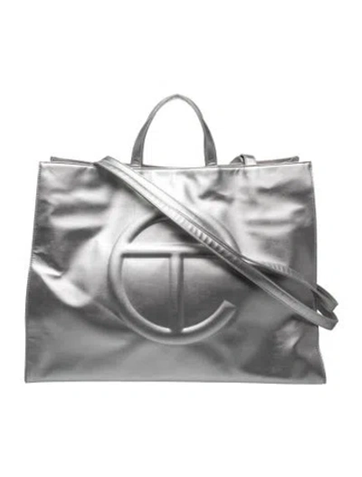 Pre-owned Telfar Vegan Leather Crossbody Bag In Metallic/silver