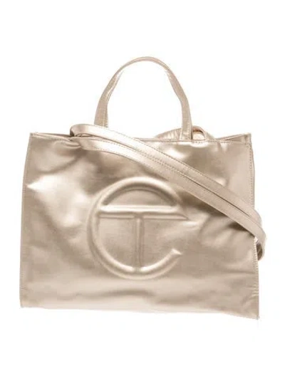 Pre-owned Telfar Vegan Leather Shopping Bag Medium In Gold