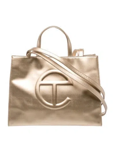 Pre-owned Telfar Vegan Leather Shopping Bag Medium In Gold/metallic