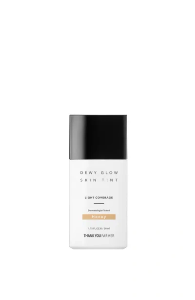 Thank You Farmer Dewy Glow Skin Tint Honey In Transparent