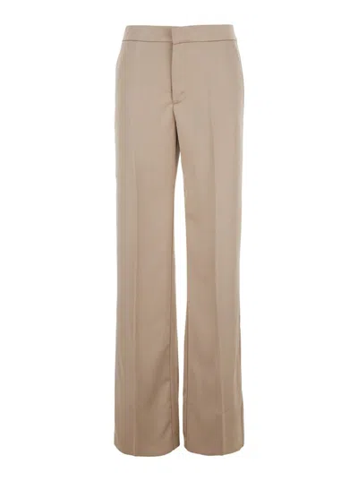 THE ANDAMANE BEIGE PANTS WITH PENCES ON THE FRONT IN TECH FABRIC WOMAN