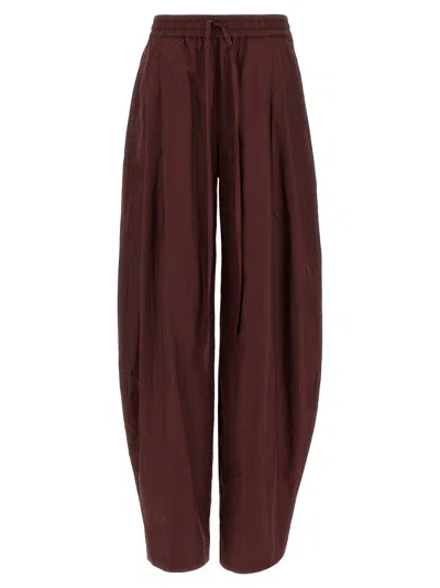The Andamane Taffeta Pants In Burgundy