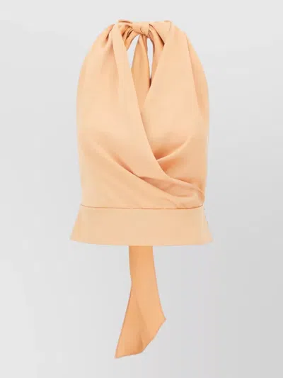 The Andamane Draped Sleeveless Top Bow Detail Buttons In Neutral