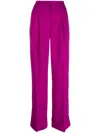 The Andamane Wide-leg Flared Trousers In Fuchsia