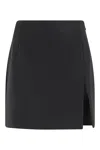 The Andamane Fitted Black Mini Skirt With Subtle Slit Detail In Black