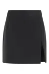 The Andamane Fitted Black Mini Skirt With Subtle Slit Detail In Black