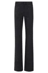 The Andamane Flared High Waist Trousers With Stud Embellishments In Black
