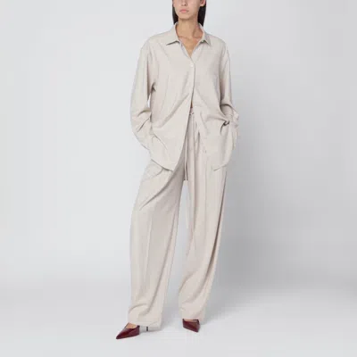 The Andamane Ivory Melange Trousers For Women In Neutral