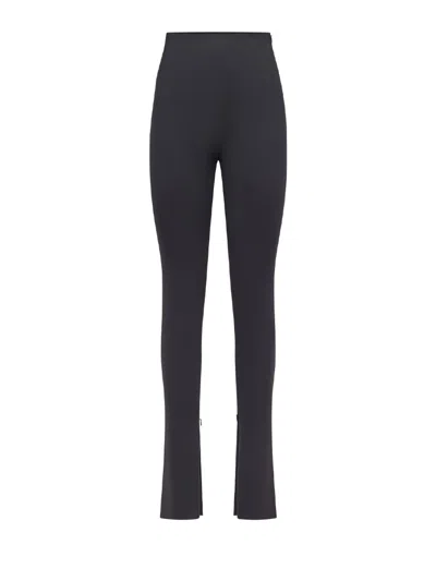 The Andamane New Holla Zipped-hem Trousers In Black