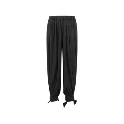 The Andamane Noor Tied-cuff Trousers In Black