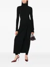 The Andamane Tessa Jumpsuit Draped High Neckline Long Sleeves In Black