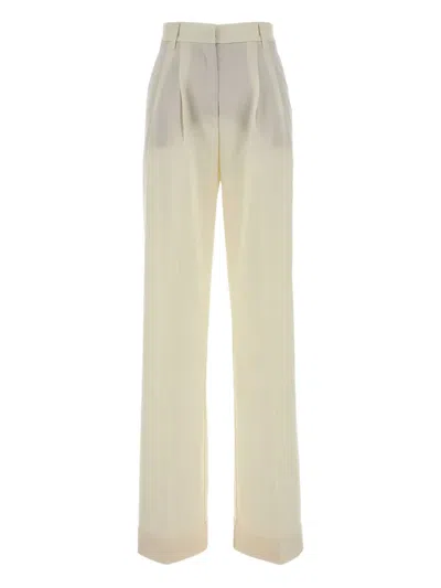 THE ANDAMANE PLEATED PALAZZO TROUSERS