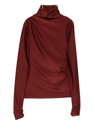 The Andamane Turtleneck Blouse In Black