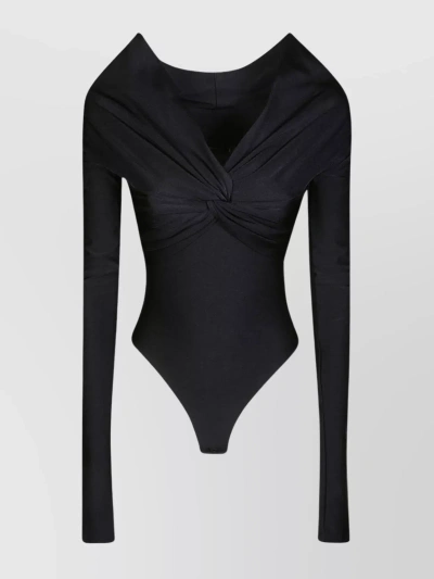 The Andamane Twist Front Long Sleeve Stretch Top In Black